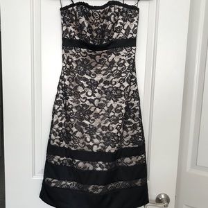 Timeless lace overlay dress with beaded accents